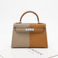 Sophisticated crossbody and shoulder bag in Kelly style, made from real leather with a polished, structured finish.

