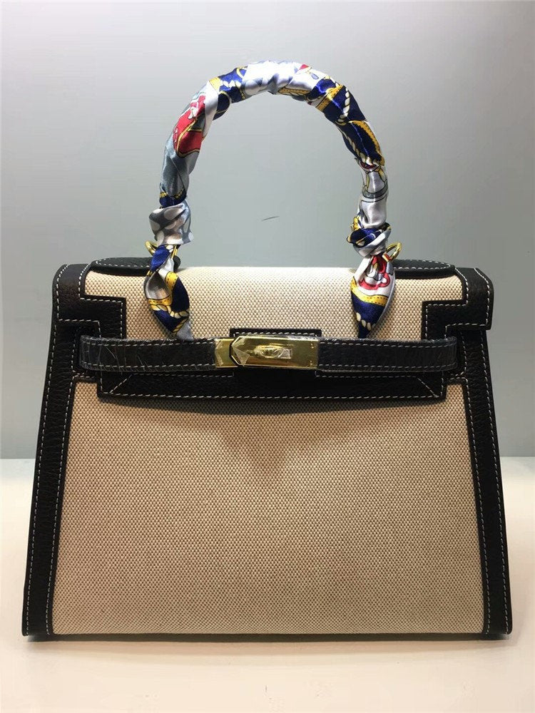 Stylish Kelly-inspired handbag with leather build, structured body, and multipurpose strap for everyday sophistication.

